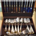K05. Stainless flatware set.